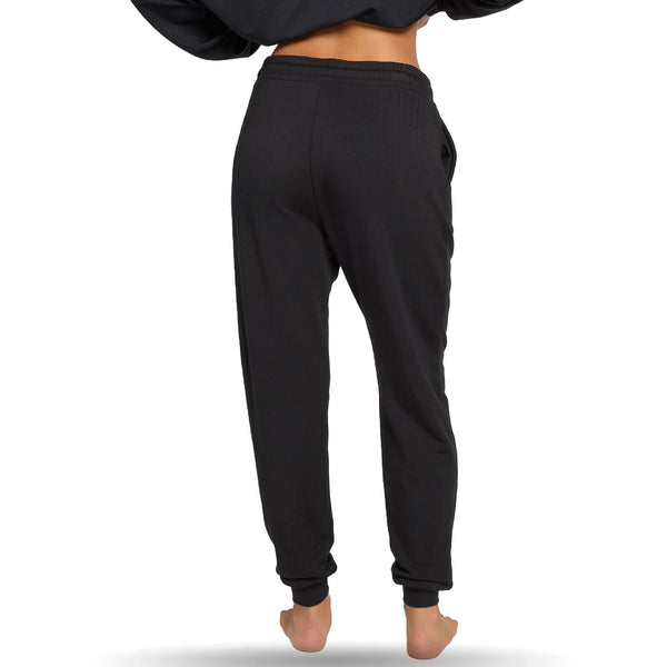 Person wearing black joggers, viewed from the , with elastic waistband and relaxed fit