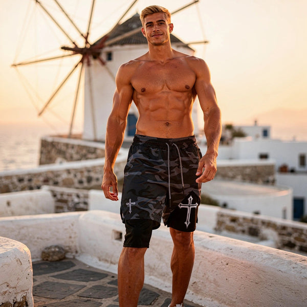 View of gray and black sporty activewear 2 in 1 shorts featuring breathable fabric and an elastic waistband