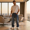 View of loose fit straight leg casual jeans in medium wash denim, featuring subtle fading and classic five pocket design