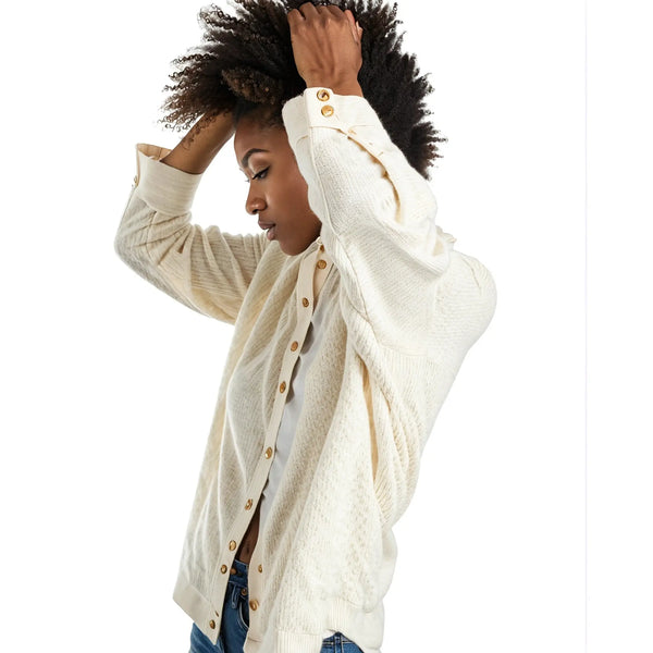 Close up view of the flirty fit cotton eyelet shirt showing intricate stitching and delicate eyelet details against a soft white background.