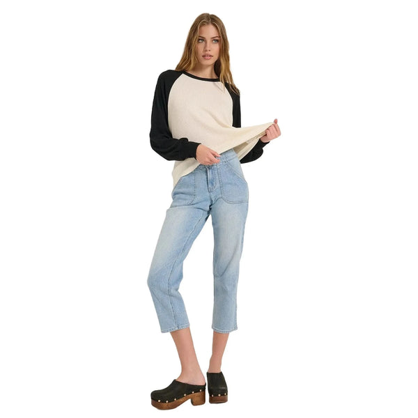 Close up view of the Emma Relaxed Raglan Long Sleeve Tee showing the soft rayon blend fabric, detailed stitching, and relaxed fit design.