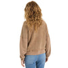 Back view of a model wearing a vintage washed fleece quarter zip pullover in Washed Camel hue, showing the construction details and relaxed fit against a white background.