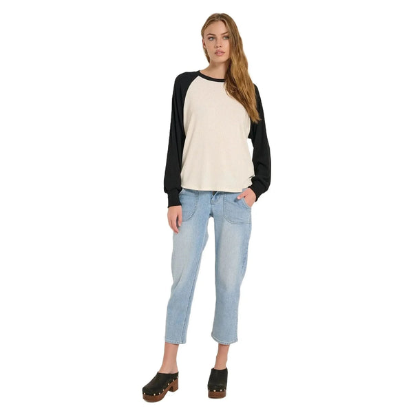 Close up of the Emma Relaxed Raglan Long Sleeve Tee showing the soft rayon blend fabric, neat stitching, and relaxed fit in a versatile color.